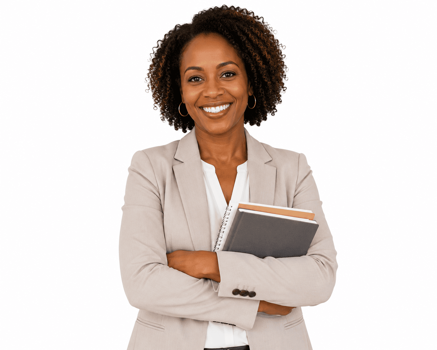A smiling educator holding notebooks